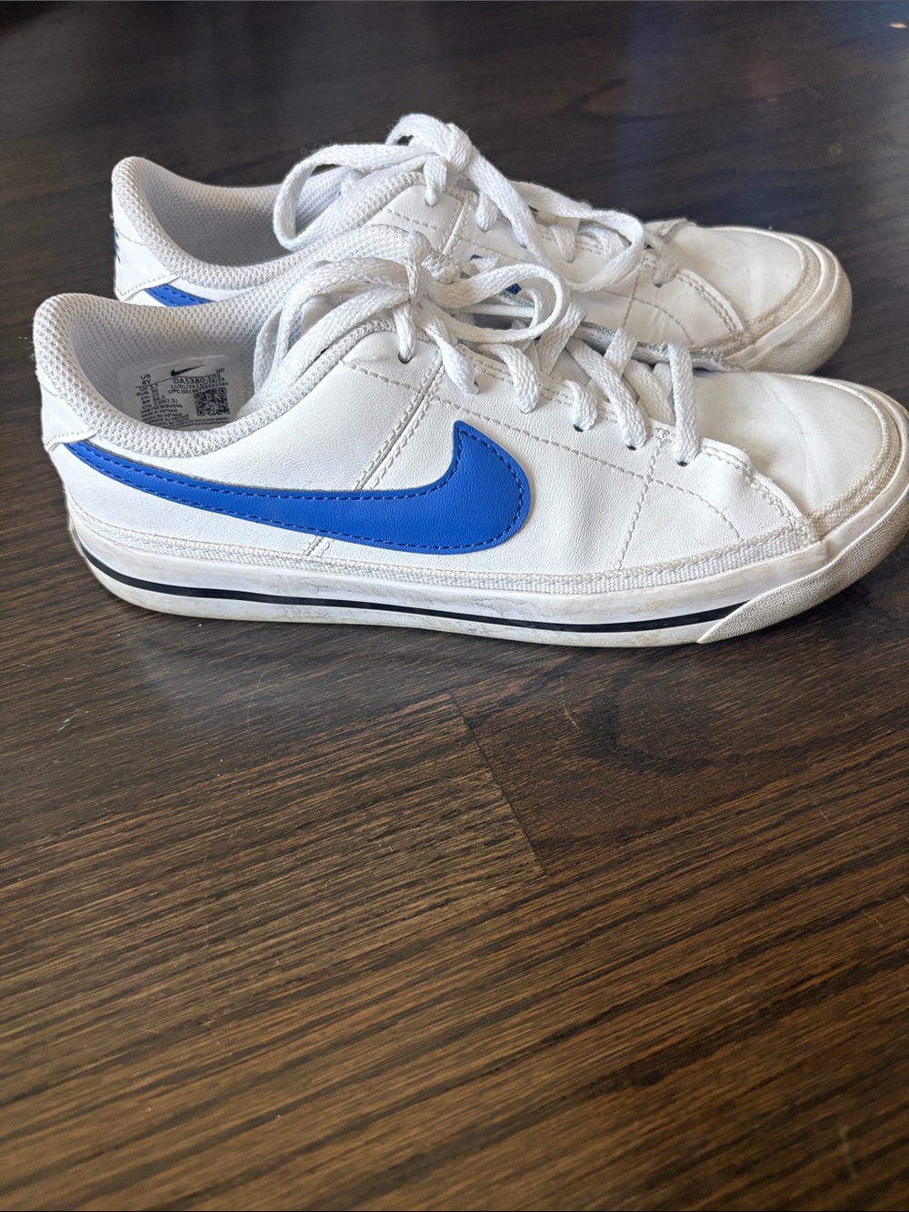 Nike White Kids Sneakers with Blue Swoosh
